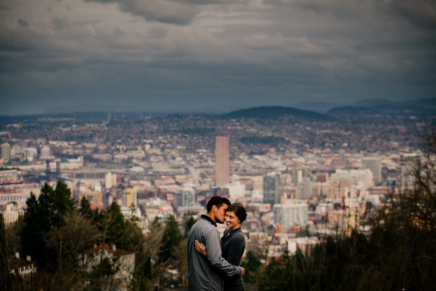 Wedding couple pose for a photograph at Pittock Mansion