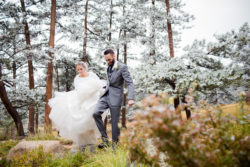 A romantic, snowy winter Estes Park wedding at Chapel on the Rock and Della Terra Mountain Chateau in Colorado, with photos by Stark Photography.