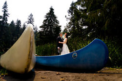 wedding portrait with canoes