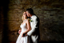 artistic portrait of a couple at their winery wedding