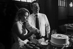Newlyweds cut the cake at Sunshine Mill Winery Wedding