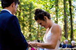 Ring ceremony at a camp Colton wedding
