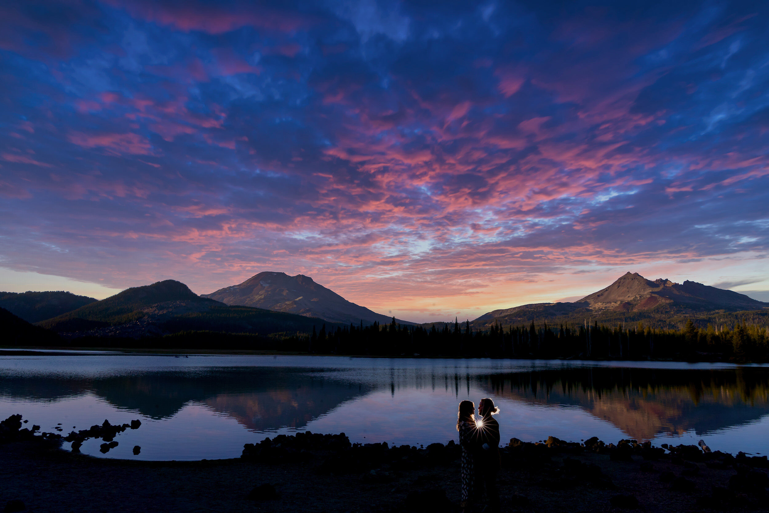 Stunning South Sister and Broken Top at sunset during a fall engagement session at Sparks Lake