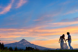 just married couple at sunset in front of Mt. Hood Oregon