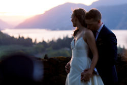 A couple embrace during their sunset portraits at their wedding in Oregon.