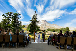 a wedding ceremony in front of Mt. Hood in Oregon