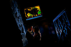 bride and groom pose for a photo at The blue ox inside timberline lodge