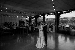 newly married couple dance inside a barn wedding venue in Columbia gorge